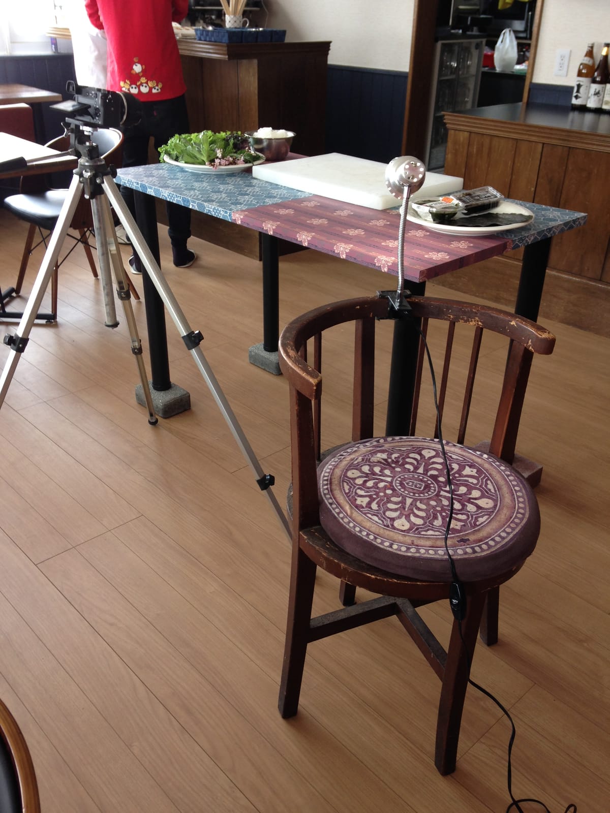 Behind the scenes — the shoot setup with camera, ingredients and prep table