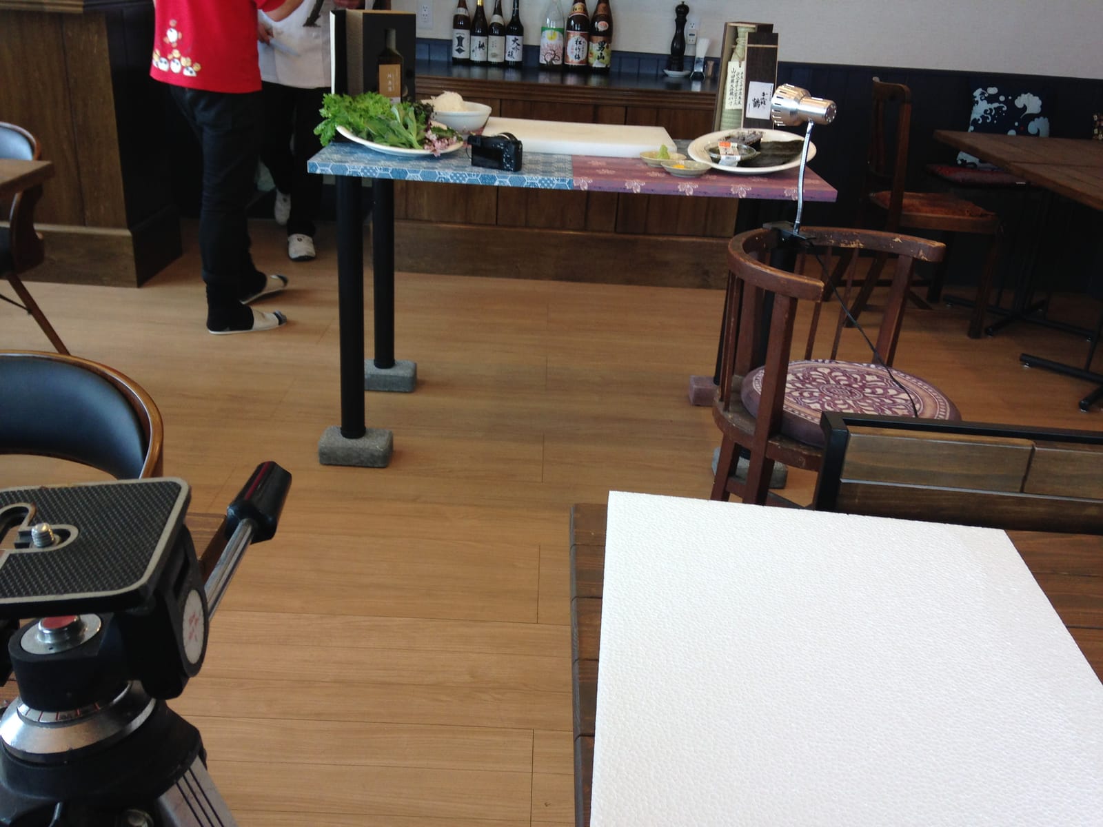 Behind the scenes — the camera and table set up for the restaurant shoot