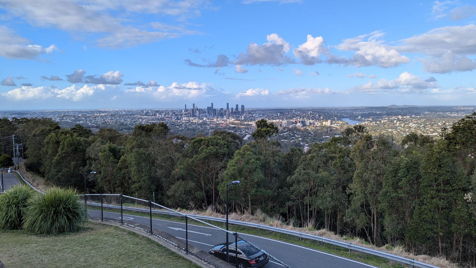 The Brisbane skyline seen across the bush from a lookout